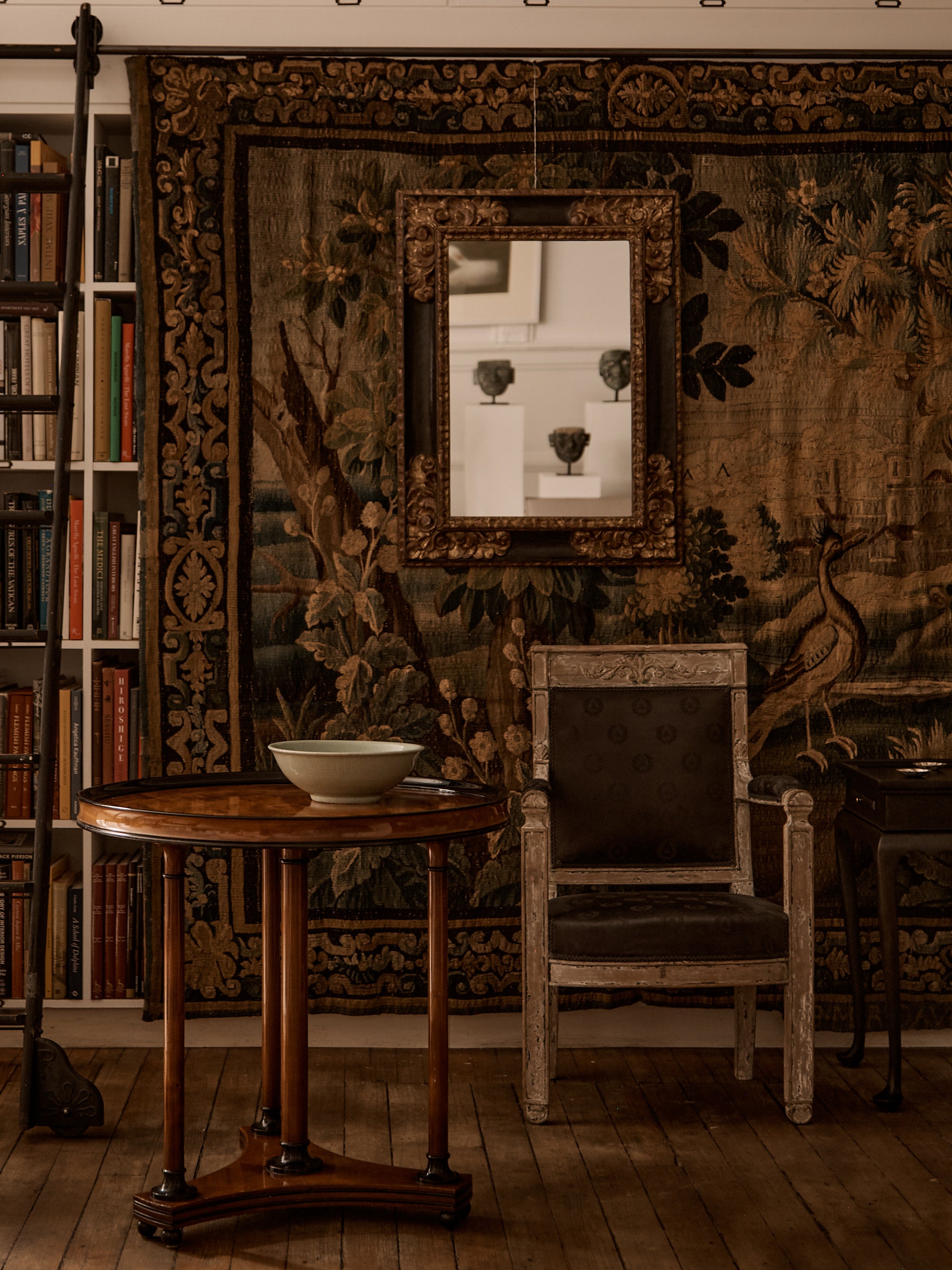 Black and gilt frame mirror